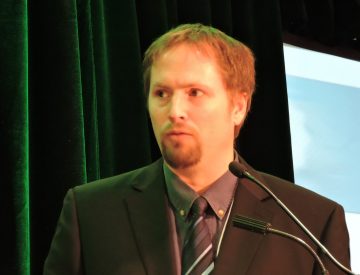 ReNew Magazine's Andrew Macklin poses a question to panel.